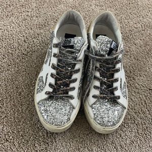 Golden goose hi star 2021 with glitters worn twice too heavy for me like new.